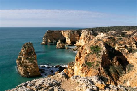 Zonsondergang over de kliffen van de Algarve
