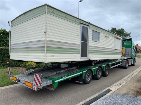 Infographic met de belangrijkste kostenfactoren voor het transport van een stacaravan