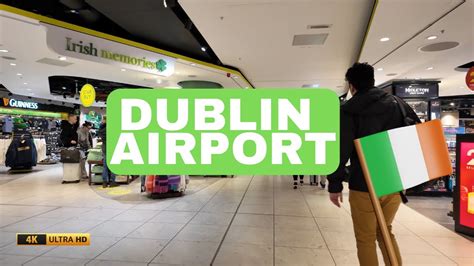 Informatiebord op Dublin Airport met logo's van autoverhuurbedrijven