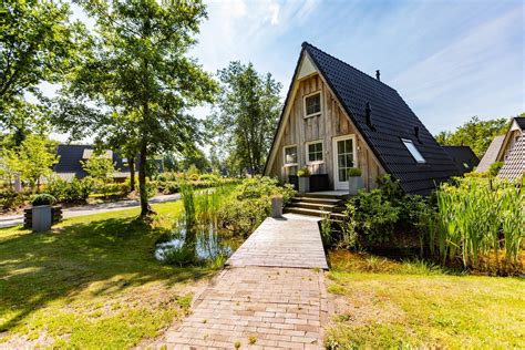 Foto van Villapark Eureka, een luxe vakantiehuisje in een groene omgeving