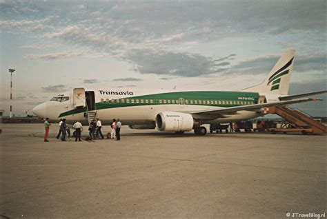 Illustratie van een Transavia vliegtuig op de luchthaven van Verona
