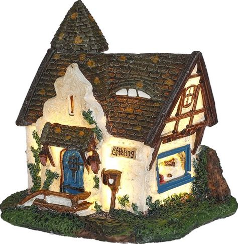 Gedetailleerde miniatuur van een Efteling sprookjeshuisje, zoals het Huis van Roodkapje.
