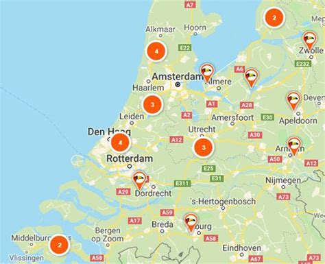 plattegrond van Nederland met gemarkeerde locaties van de overgenomen reisbureaus