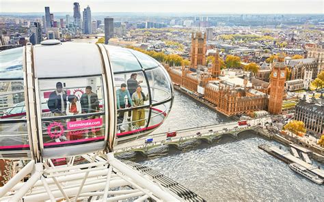 Foto van de London Eye met een dubbeldekkerbus op de voorgrond