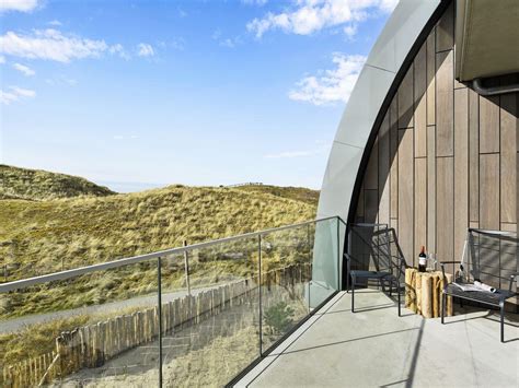 Artistieke impressie van Residence Westduin met duinlandschap op de achtergrond.
