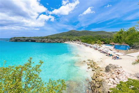 Een collage van de mooiste stranden van Curaçao: Klein Curaçao, Grote Knip, Playa Porto Mari, Playa Lagun.