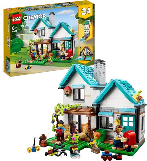 Detail van het LEGO Creator Knusse Huis: schuin geplaatste 1x1 tegels in aqua en turquoise die dakpannen simuleren.