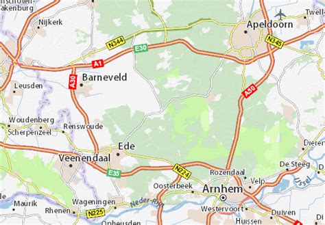 Een kaart van Otterlo en omgeving, met de locatie van Het Uilennest gemarkeerd en de belangrijkste bezienswaardigheden aangegeven.