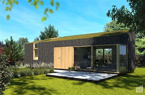 Foto van een modern tiny house met uitzicht op een weiland