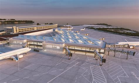 Historische foto van de oorspronkelijke terminal van Cyril E. King Airport, mogelijk een oude militaire hangar.